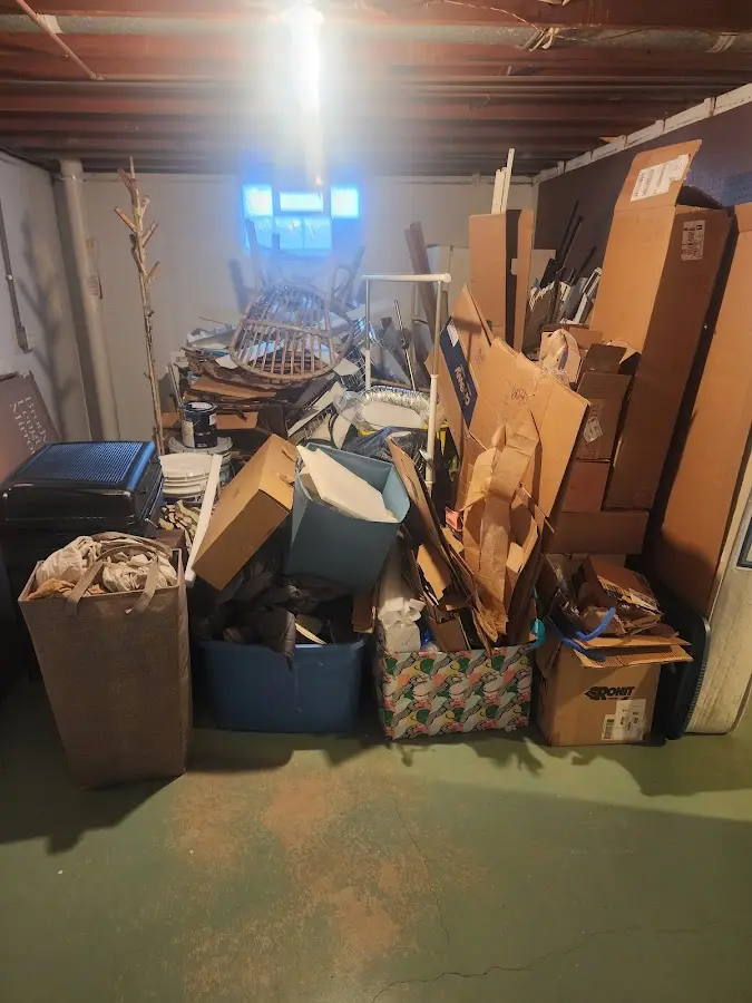 Roll-off dumpster container at job site for Concrete Dumpster Rental in West Milton